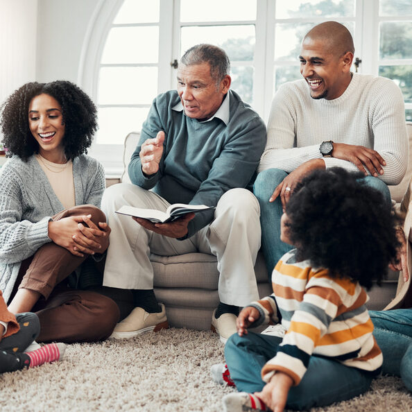 Family relax, wow with fantasy and reading book, grandparents with parents and kids at home for storytelling. Surprise, shock and imagine, generations and happy people with novel, bonding and love