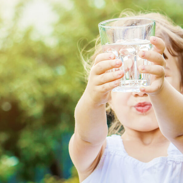 Child drinks water.